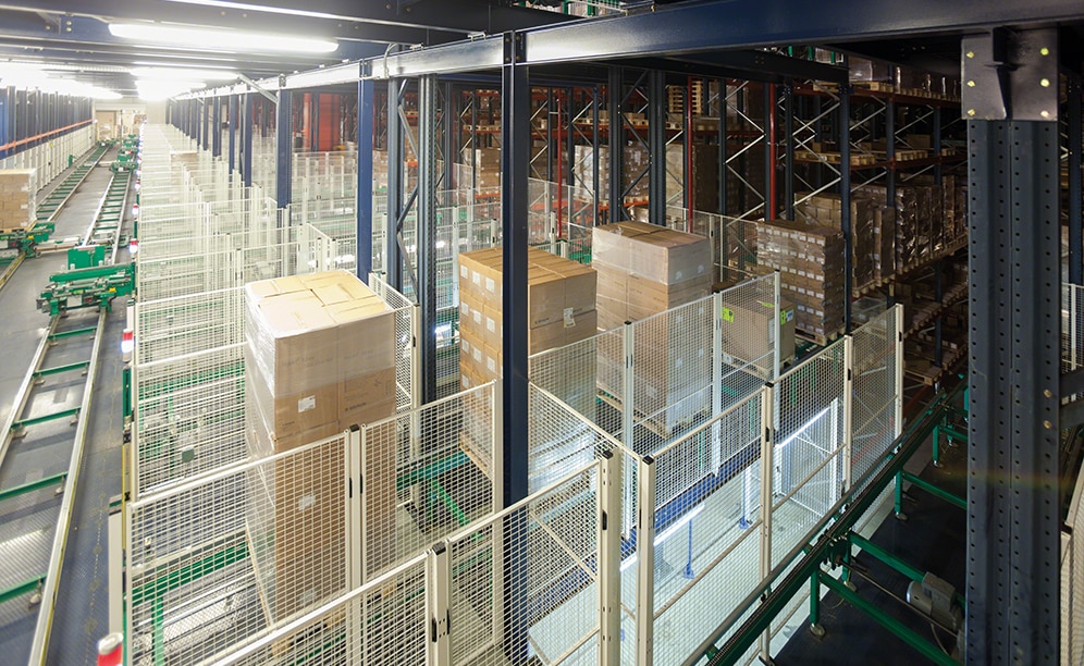 Autonomous trolleys, circulating via electrified monorails, connect the aisle input and output conveyors with warehouse outbuildings, where the tasks of receiving, sorting and forwarding of orders are performed